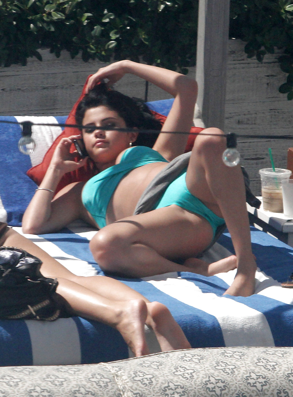 Selena Gomez Bikini At Pool In Miami Sep 17 2012  #13870466