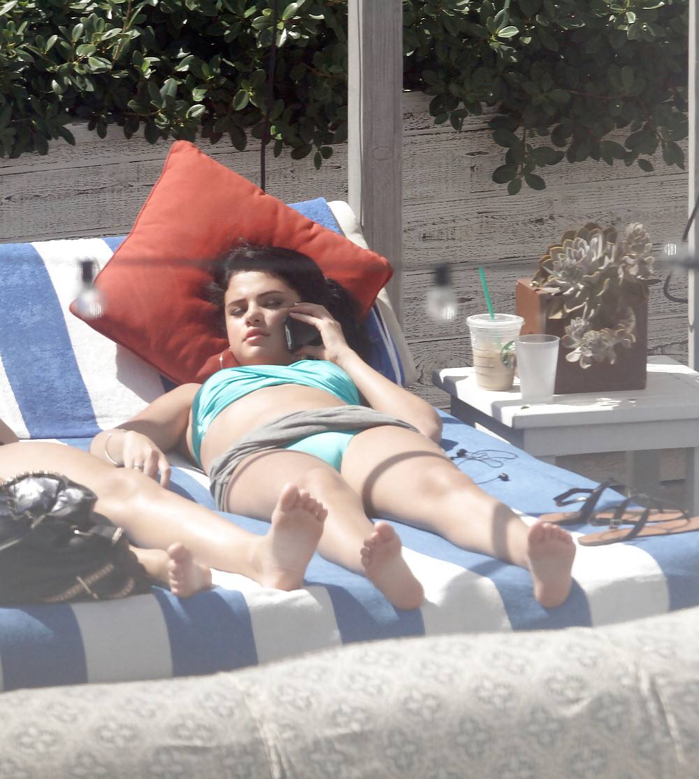 Selena Gomez Bikini At Pool In Miami Sep 17 2012  #13870534