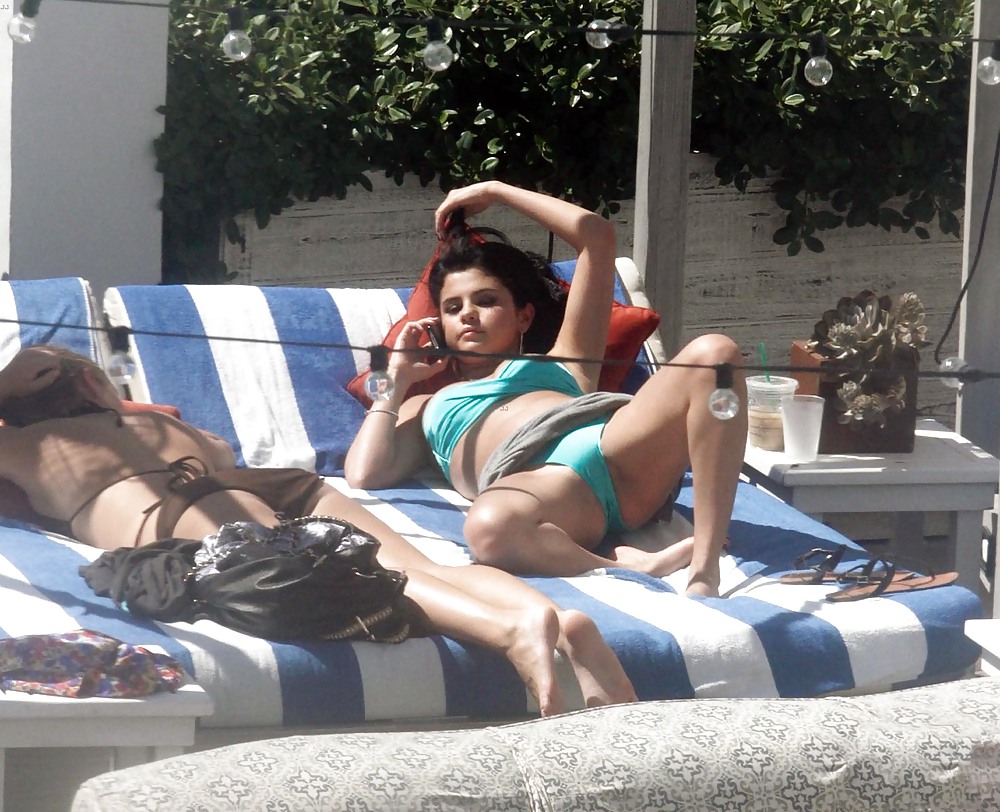 Selena Gomez Bikini At Pool In Miami Sep 17 2012  #13870554
