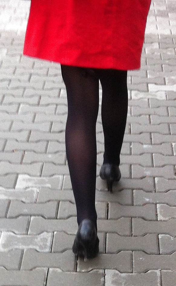 Red coat and black pantyhose 