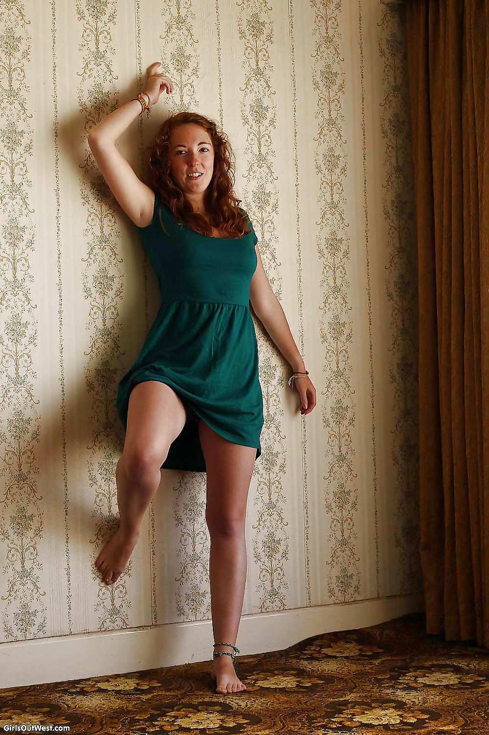 Redhead strips green dress to show pussy #22002068