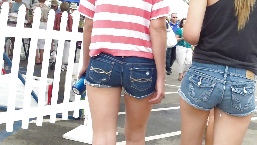 Teen butts & ass in shorts at the fair  #19402484