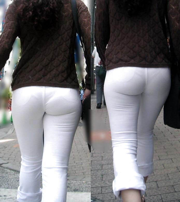 Femmes Chaudes Dans Un Pantalon Blanc Serré #16609181