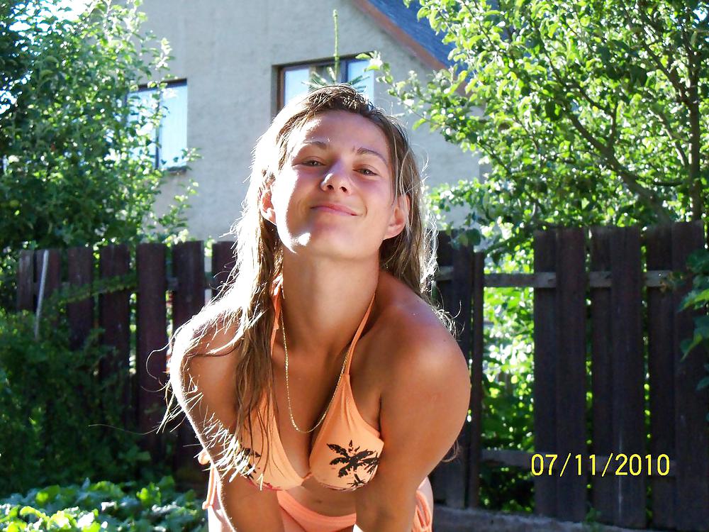 Cute Blonde Teen outside in the Garden #12356355