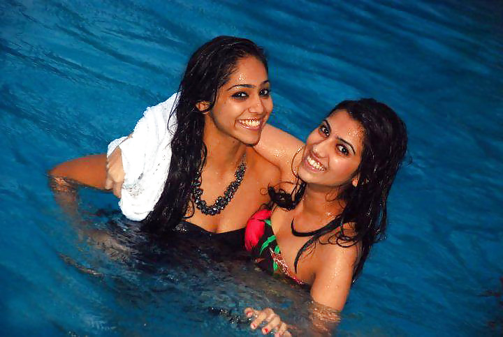 Indian Ladies at Pool Social gathering #9412224