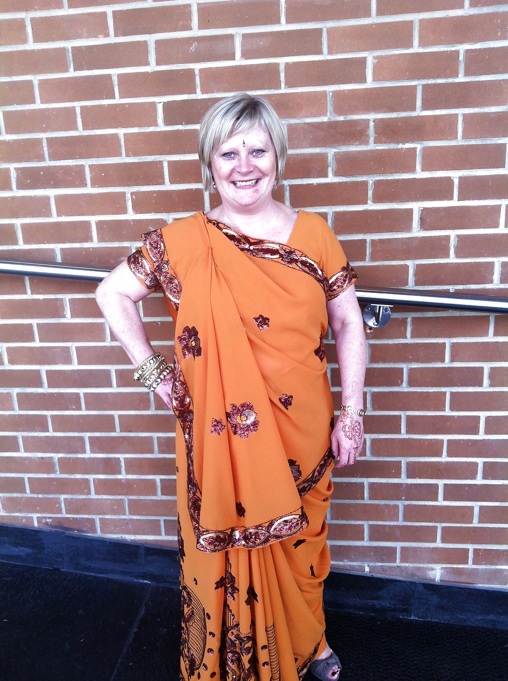 Fat wife makes a sari #16394050