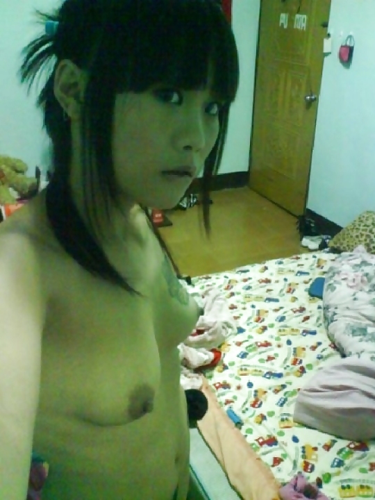 Tattooed asian girl takes pictures of her small breasts #4173320