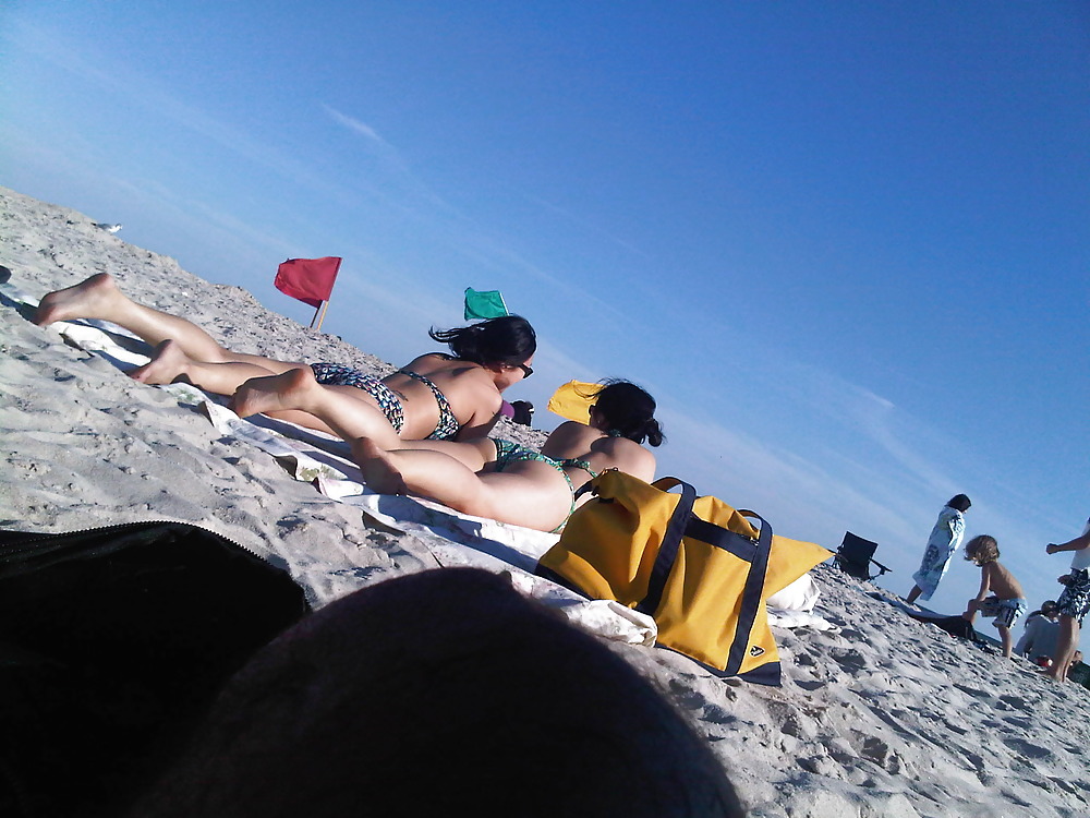 Asians laying on the beach #1338399