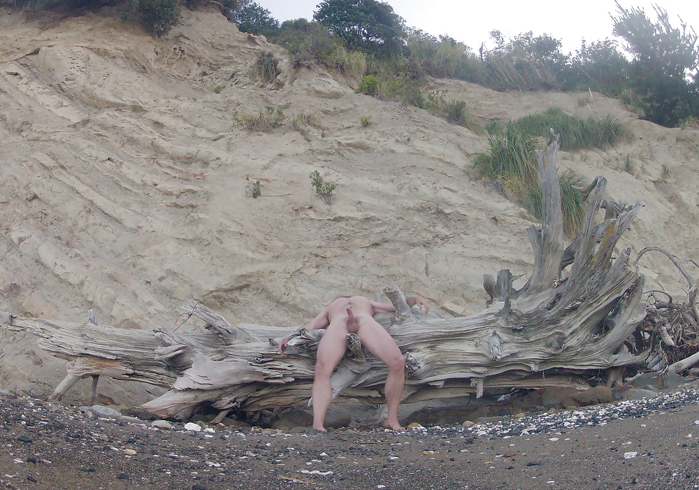 Naked, hard and stroking at the beach #15978298