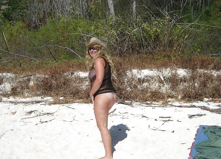 Posing for my husband in the beach #21290215