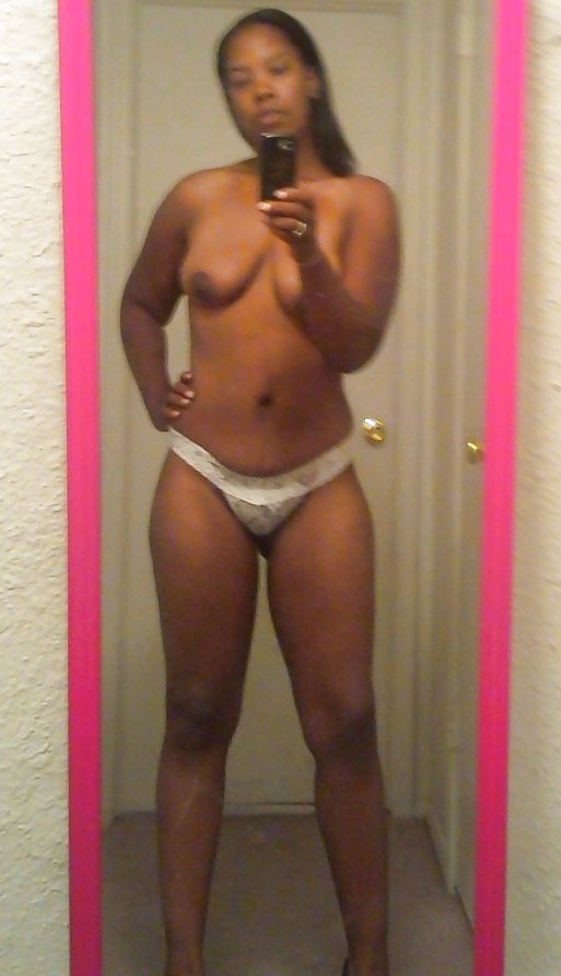 Tall Brownskin Chick posing for boyfriend