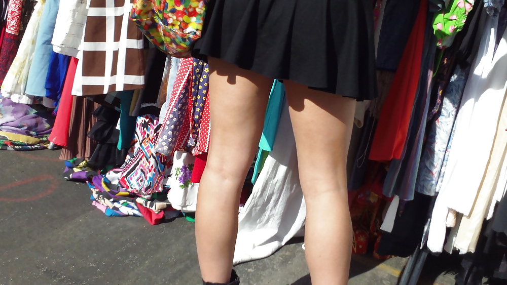 Hot teen girl in short black skirt with nice legs #8858595