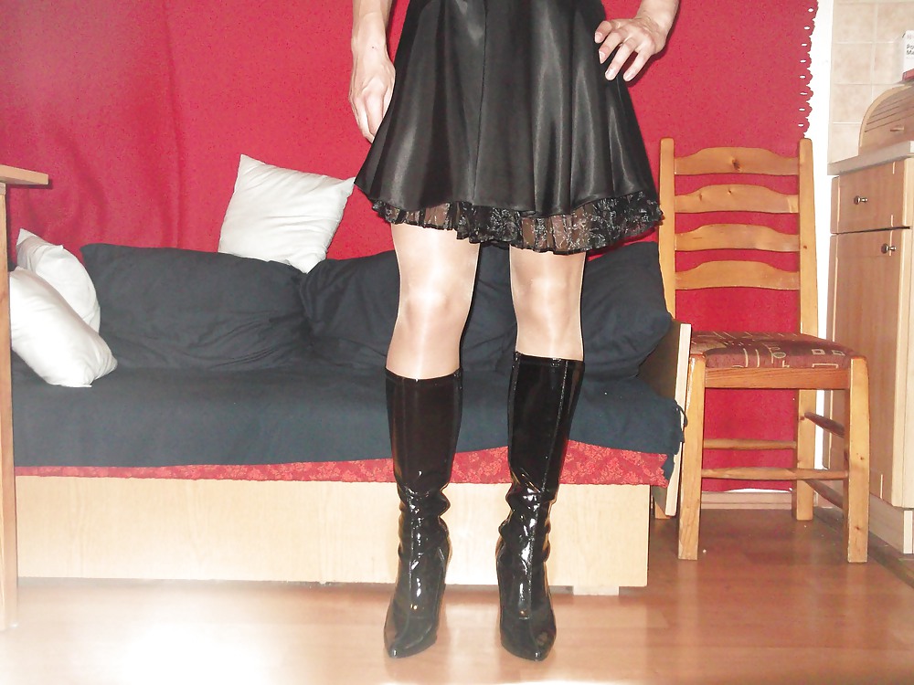 Black satin dress and vinyl boots #21519716