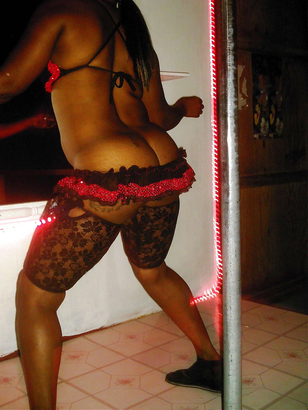 Ebony stripper on stage performing #4246458