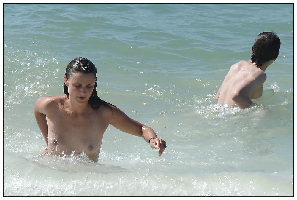 Topless beach girl in France 1
