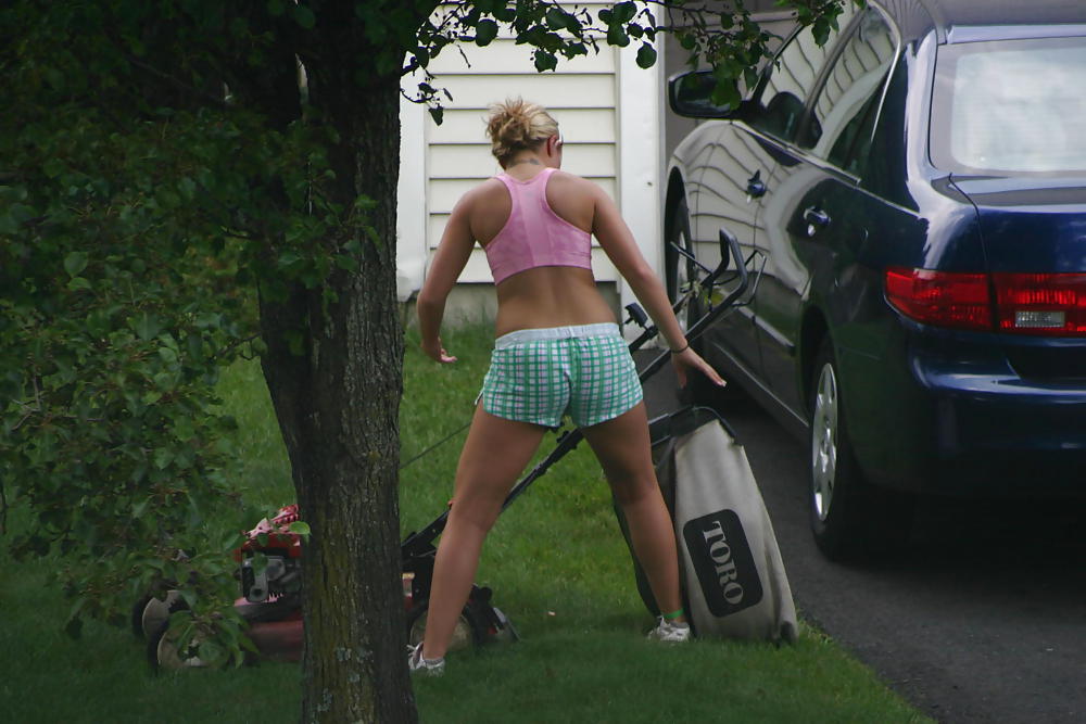 Neighbor mowing her lawn #5412518