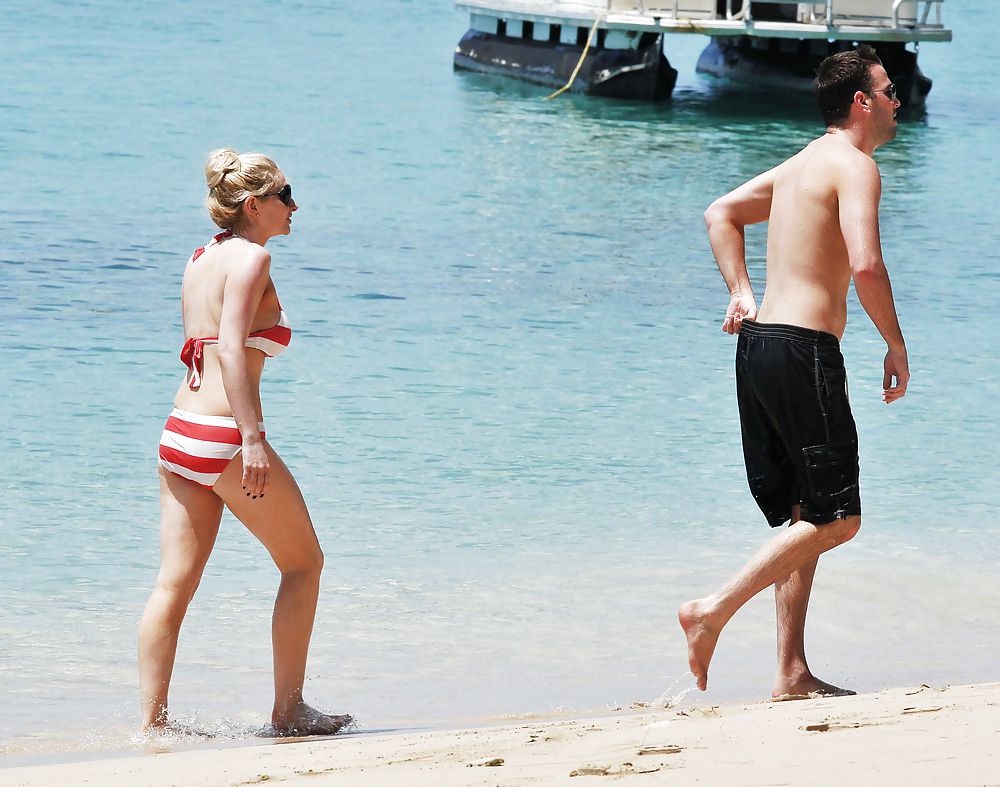 Gemma Merna Playing at the Beach in a Red and White Bikini #4797357