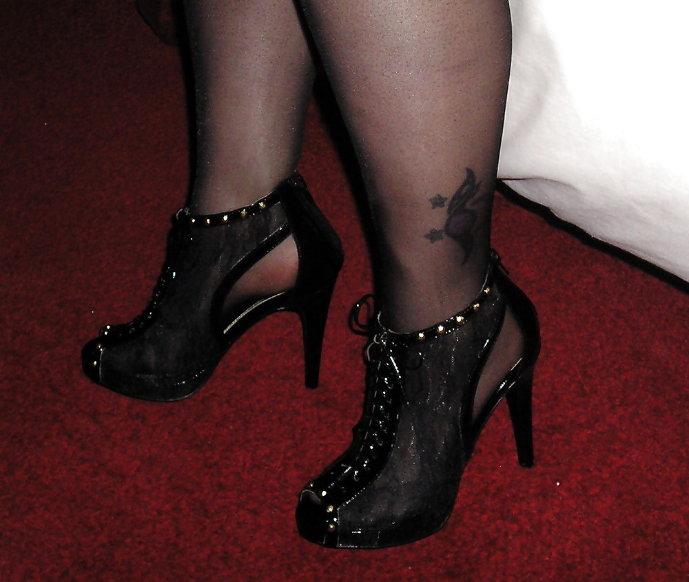 Black pantyhose tights and heels. #22543885