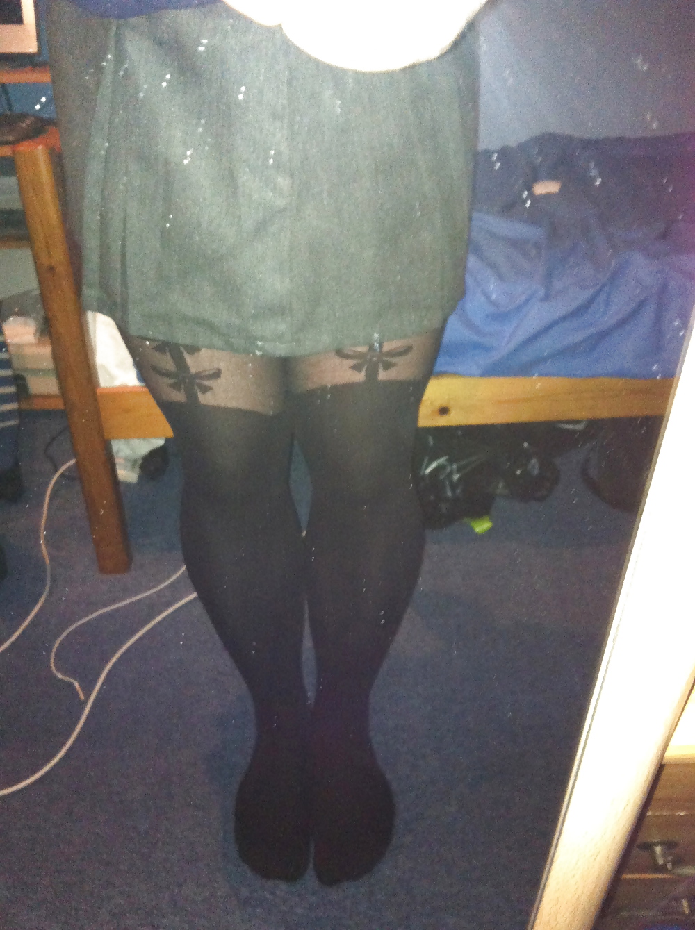 Tights and grey skirt
