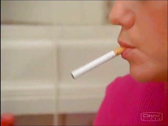 Megyn Price Smoking Cigarettes #8540992