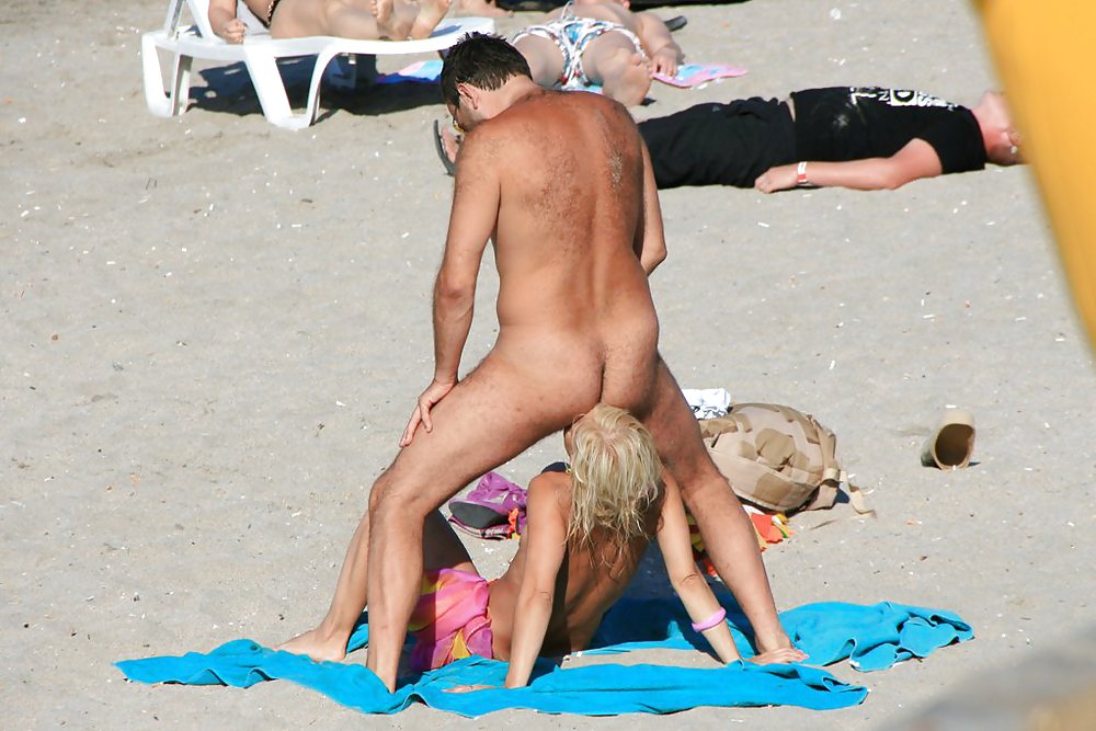 Nudist having fun at the Beach