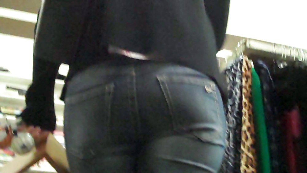 Following her ass and butt in denims