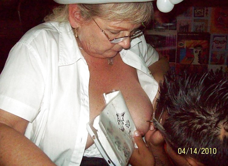 Getting a tattoo in the bare tits #22210988