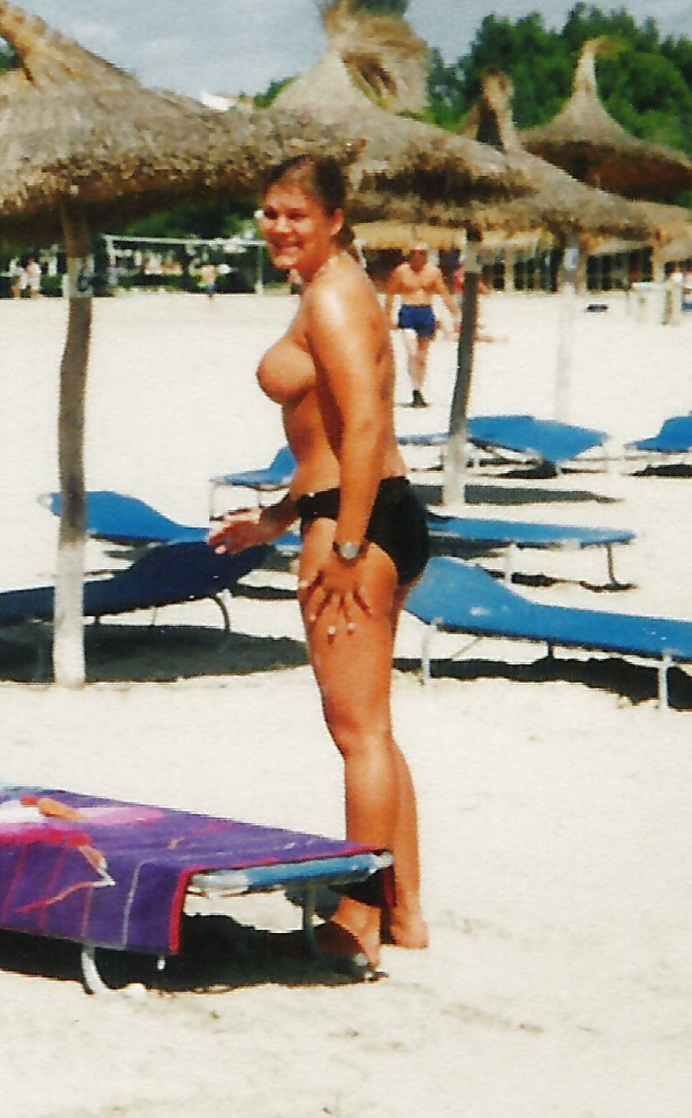 Teen with big tits on the beach