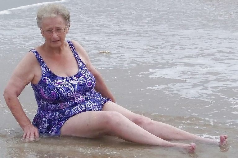 Old granny at beach  #19960670