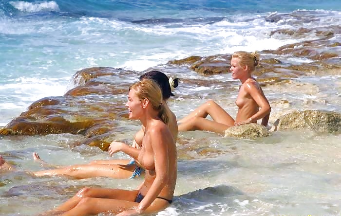 Three girls have fun on the beach - N. C.  #2449947