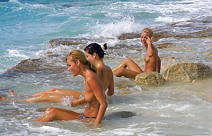 Three girls have fun on the beach - N. C.  #2450011