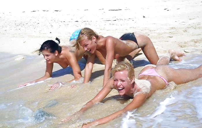 Three girls have fun on the beach - N. C.  #2450019