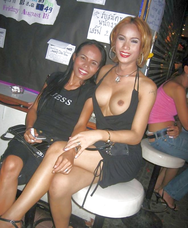 A couple of Pattaya Ladyboys #21802068