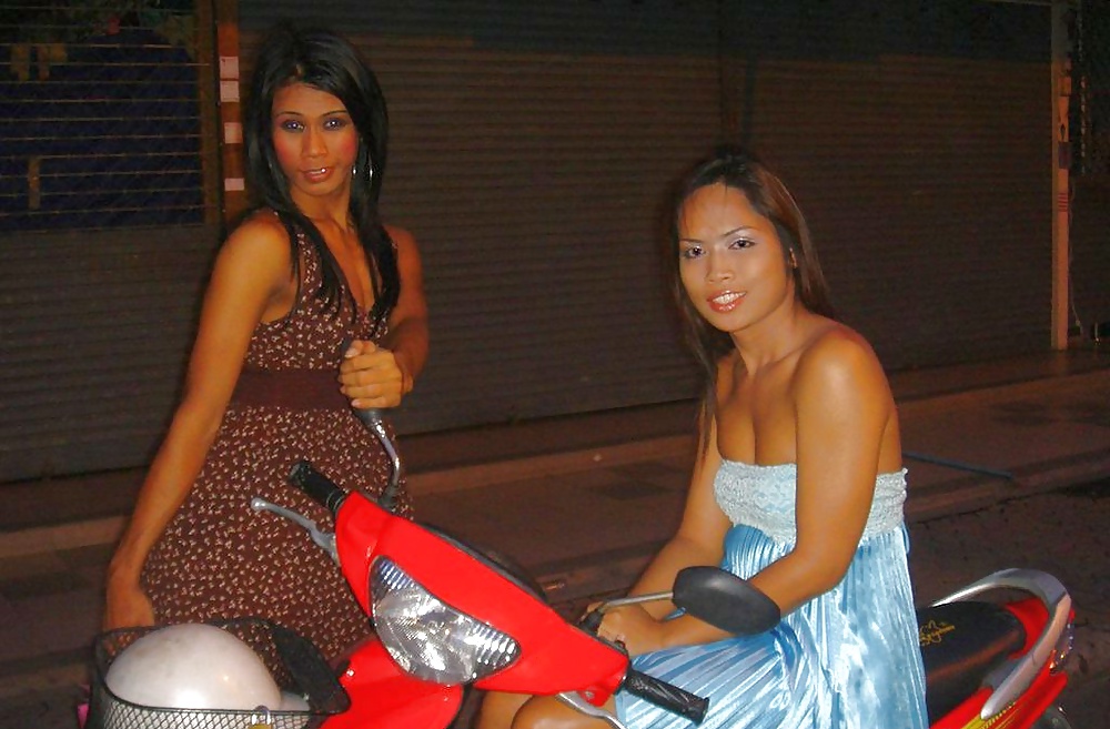 A couple of Pattaya Ladyboys #21802140