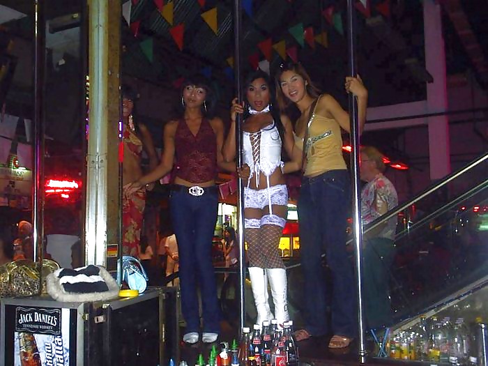 A couple of Pattaya Ladyboys #21802304