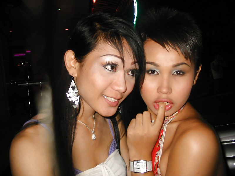 A couple of Pattaya Ladyboys #21802442