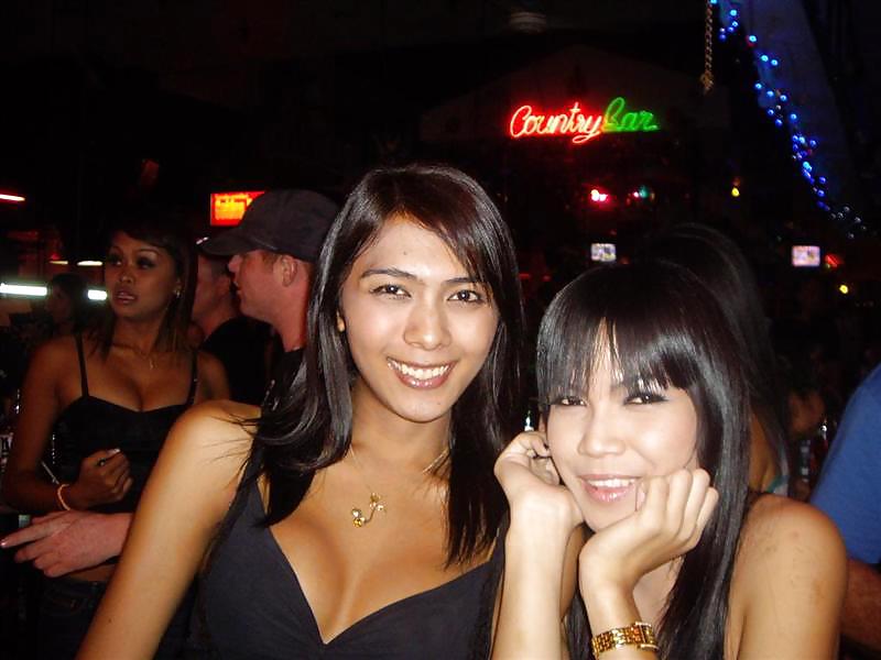 A couple of Pattaya Ladyboys #21802634