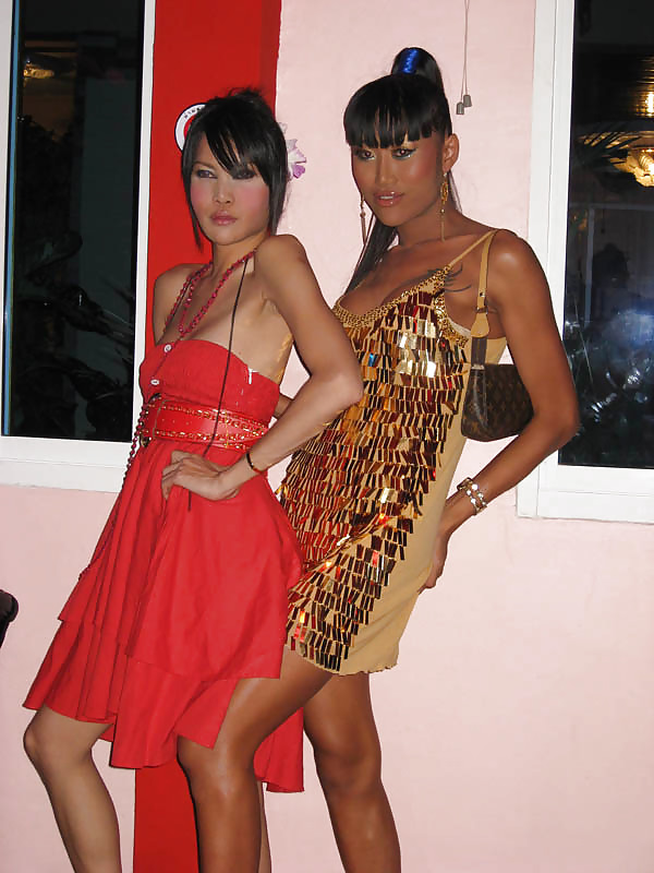 A couple of Pattaya Ladyboys #21802894