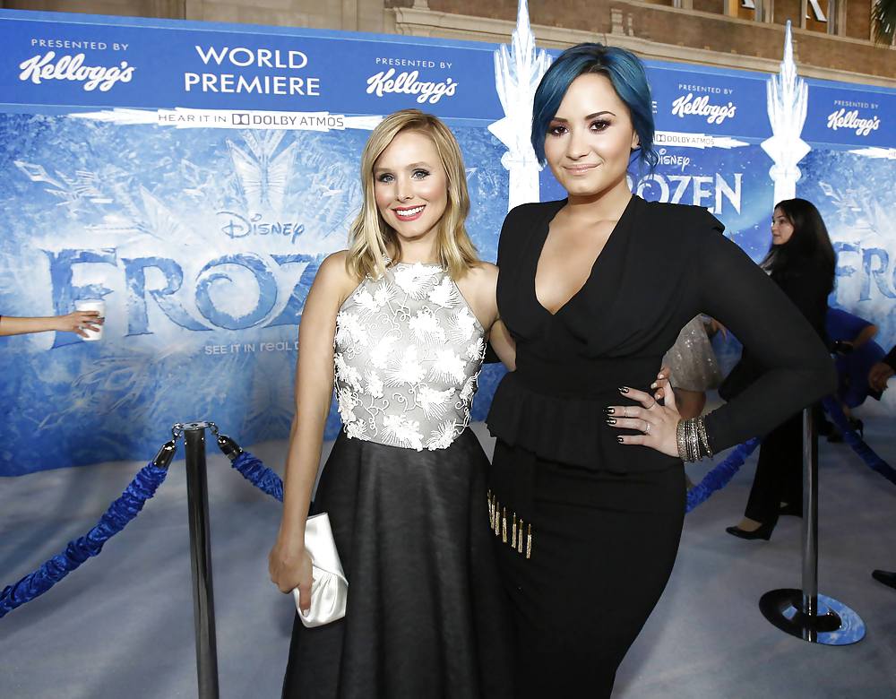 Demi Lovato with blue hair and business style #22180011