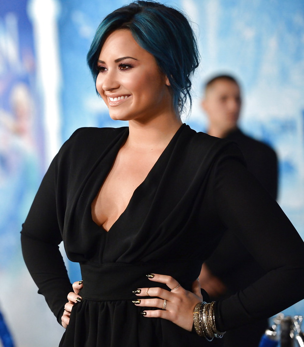 Demi Lovato with blue hair and business style #22180027