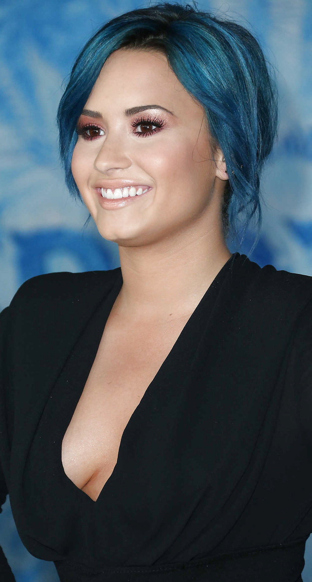 Demi Lovato with blue hair and business style #22180034