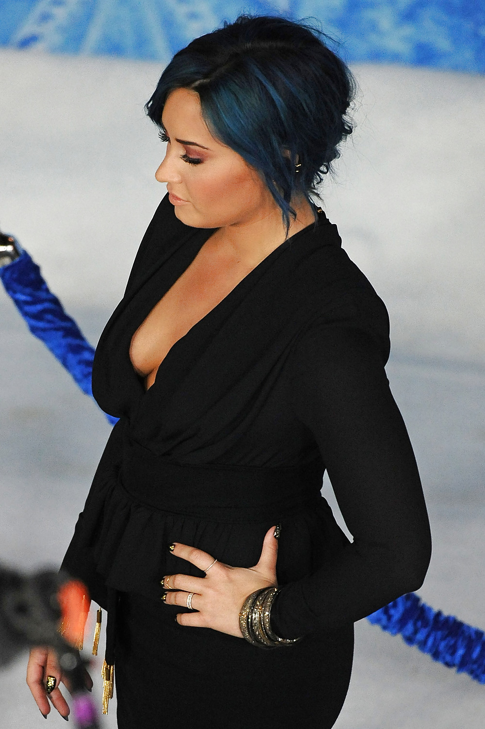 Demi Lovato with blue hair and business style #22180064