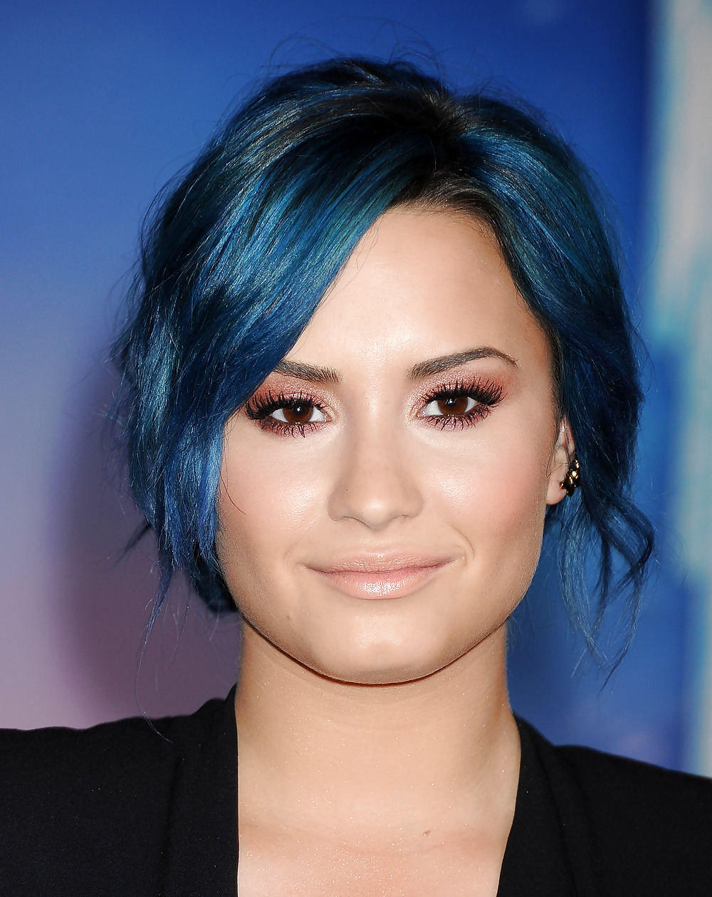 Demi Lovato with blue hair and business style #22180070