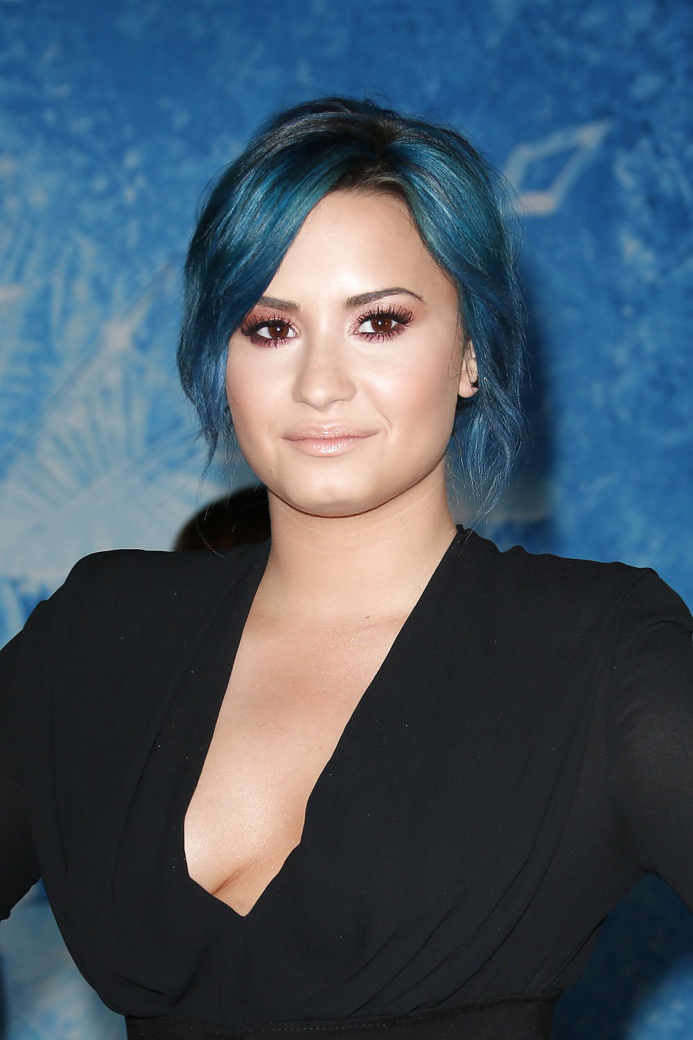 Demi Lovato with blue hair and business style #22180098