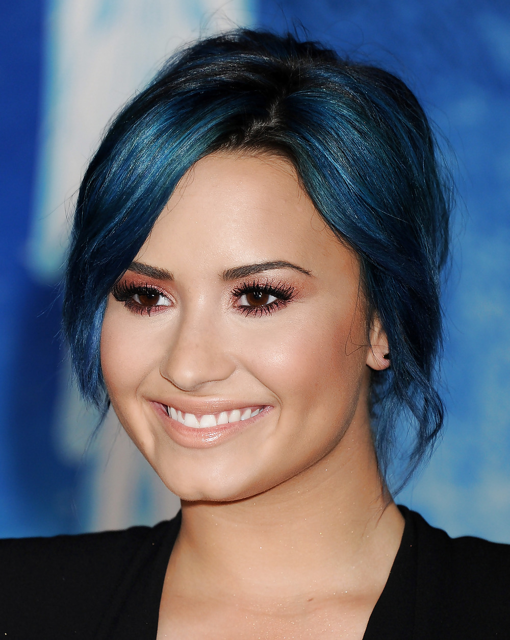 Demi Lovato with blue hair and business style #22180136