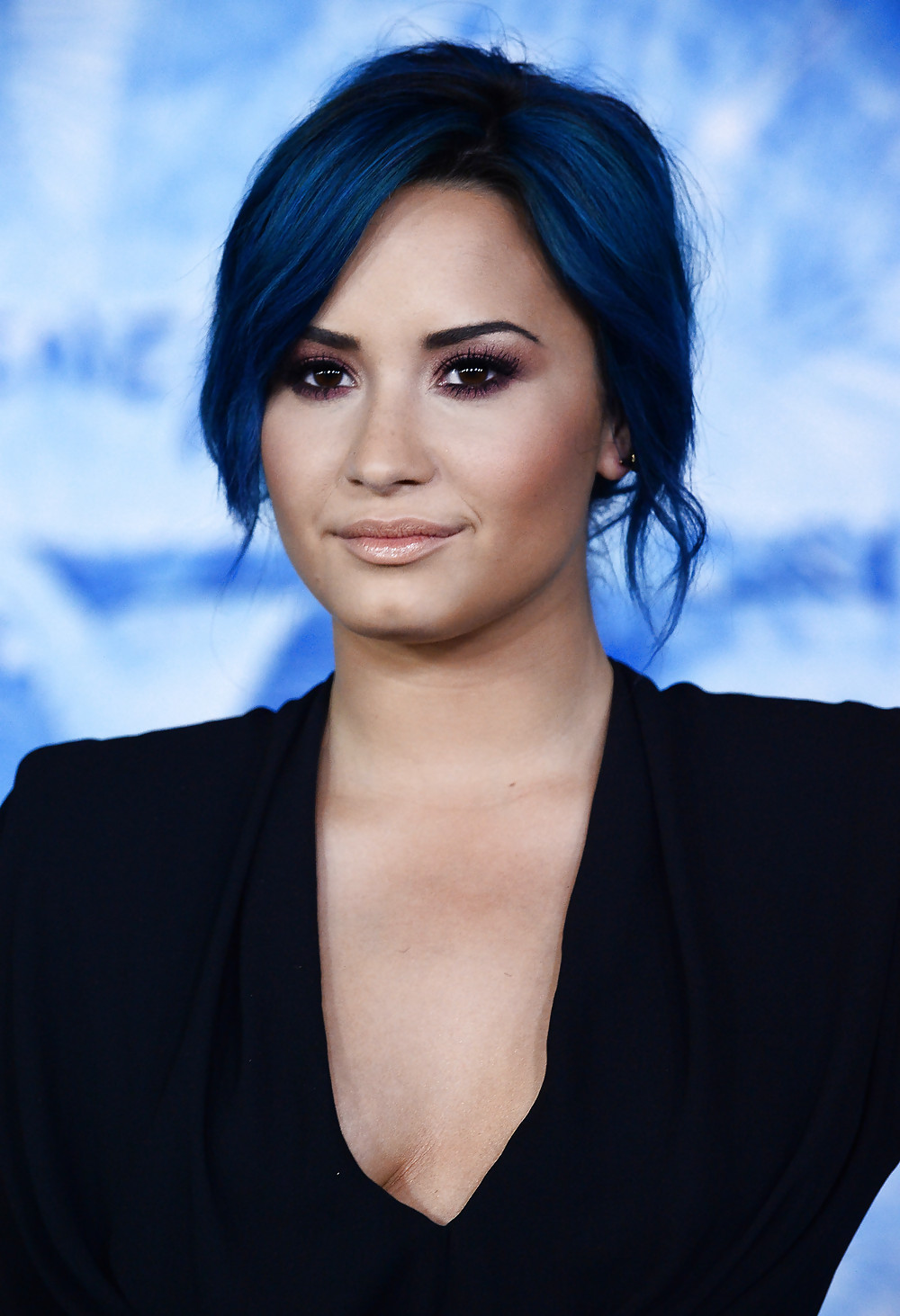 Demi Lovato with blue hair and business style #22180185