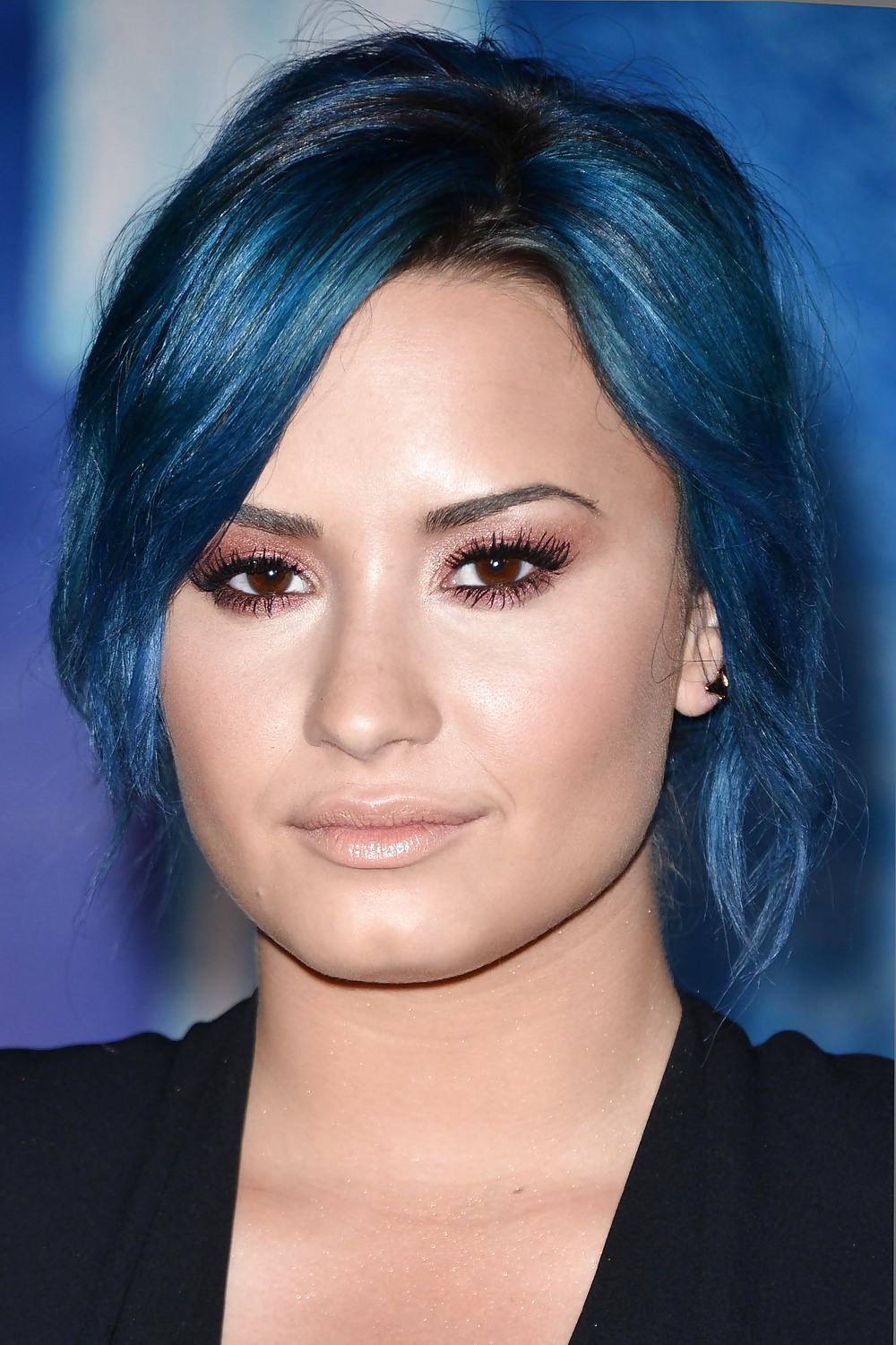 Demi Lovato with blue hair and business style #22180200