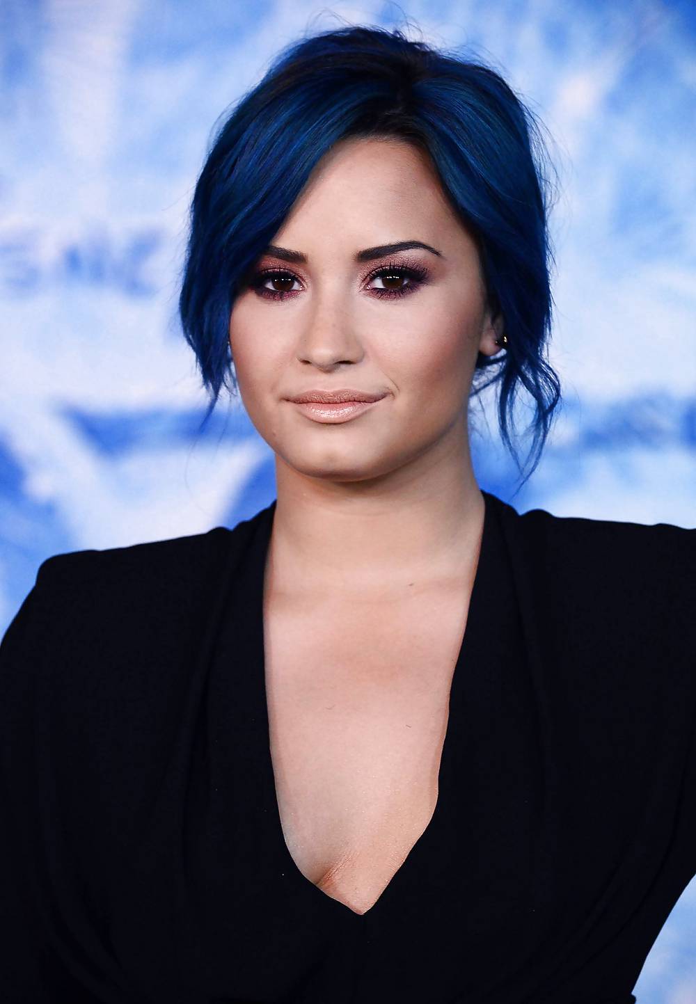Demi Lovato with blue hair and business style #22180224