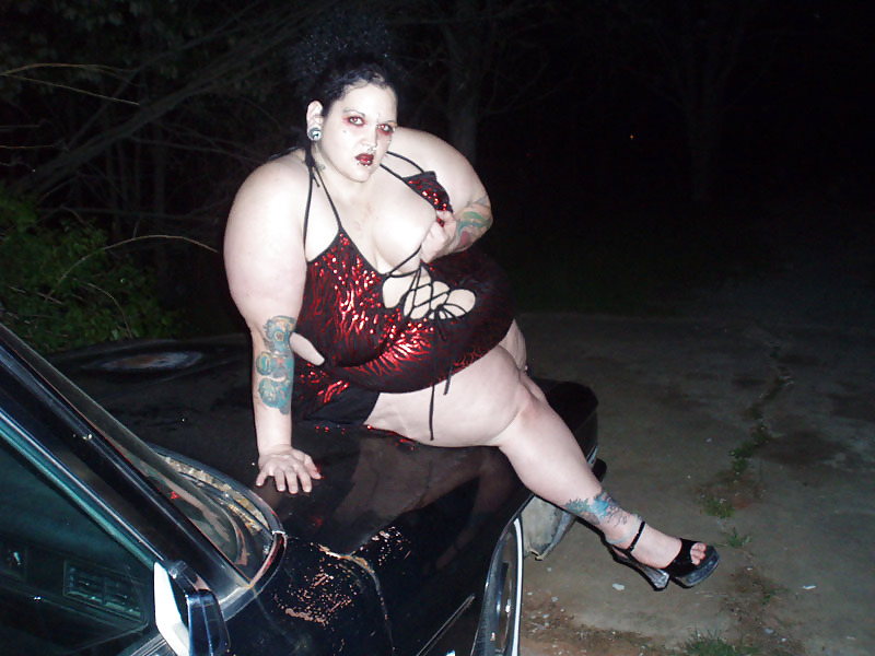 SSBBW with a real Forked Tongue poses with a Hearse #7302876