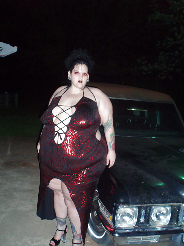 SSBBW with a real Forked Tongue poses with a Hearse #7303023